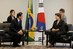 Dilma conversa Kim Hwang-Sik 