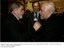 Presidente Lula e o escritor Paulo Coelho durante encontro no Fórum Econômico Mundial, ao fundo o ministro Luiz Furlan.