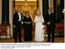Presidente Lula e dona Marisa ao lado da Rainha Elizabeth II e do Duque de Edimburgo durante banquete de estado.