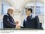 Presidente Lula conversa com o primeiro-ministro da França, François Fillon, durante encontro na Argentina.