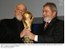 Presidente Lula e o escritor Paulo Coelho erguem a Taça do Mundo, após confirmação do Brasil como sede da Copa do Mundo de 2014.