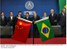 Presidente Lula acompanhado dos ministros Celso Amorim e Miguel Jorge e Franklin Martins, durante assinatura de atos.