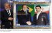 Presidente Lula recebe quadro do presidente Mahmoud Ahmadinejad, com fotos dos dois presidentes.