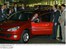 Presidente mundial da Peugeot, Jean-Martin Folz (d) e ministro Patrus Ananias (d) observam presidente Lula em carro doado pela fábrica ao programa Fome Zero.jpg