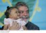 Presidente Lula abraça bebê durante encontro de Natal com catadores de material reciclável e população de rua em SP.jpg