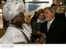 Presidente Lula e dona Marisa ao lado de uma baiana durante visita ao Salão do Turismo.jpg