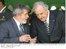 Presidente Lula conversa com o ministro da Defesa, Nelson Jobim, durante solenidade na Academia Militar das Agulhas Negras.