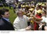 Presidente Lula e o governador Aécio Neves cumprimentam populares na abertura da 73ª ExpoZebu.