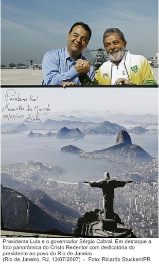 Presidente Lula e o governador Sérgio Cabral. Em destaque a foto panorâmica do Cristo Redentor com dedicatória do presidente ao povo do Rio de Janeiro.