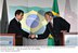 Presidente Lula cumprimenta o Presidente da França, Nicolas Sarkozy, durante seminário empresarial Parceria Brasil-UE.