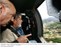 Presidente Lula e o Governador de Santa Catarina, Luiz Henrique da Silveira, durante sobrevôo às áreas atingidas por enchentes.