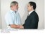 Presidente Lula cumprimenta o prefeito de Belém, Duciomar Gomes da Costa, durante reunião com representantes do Conselho Internacional do Fórum Social Mundial.