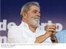 Presidente Lula durante cerimônia de entrega de escrituras de regularização fundiária no bairro Juscelino Kubitschek.