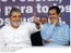 Presidente Lula e o Ministro do Trabalho e Emprego, Carlos Lupi, durante cerimônia de entrega de escrituras de regularização fundiária no bairro Juscelino Kubitschek.jpg