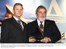Presidente Lula e o presidente da Associação Brasileira da Infraestrutura e Indústrias de Base (Abdib), Paulo Godoy, durante cerimônia de entrega do prêmio Personalidade da Infraestrutura 2009.