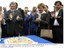 Presidente Lula recebe bolo de aniversário e homenagem dos operários da Rolls-Royce, ao lado de dona Marisa e Luiz Marinho.jpg